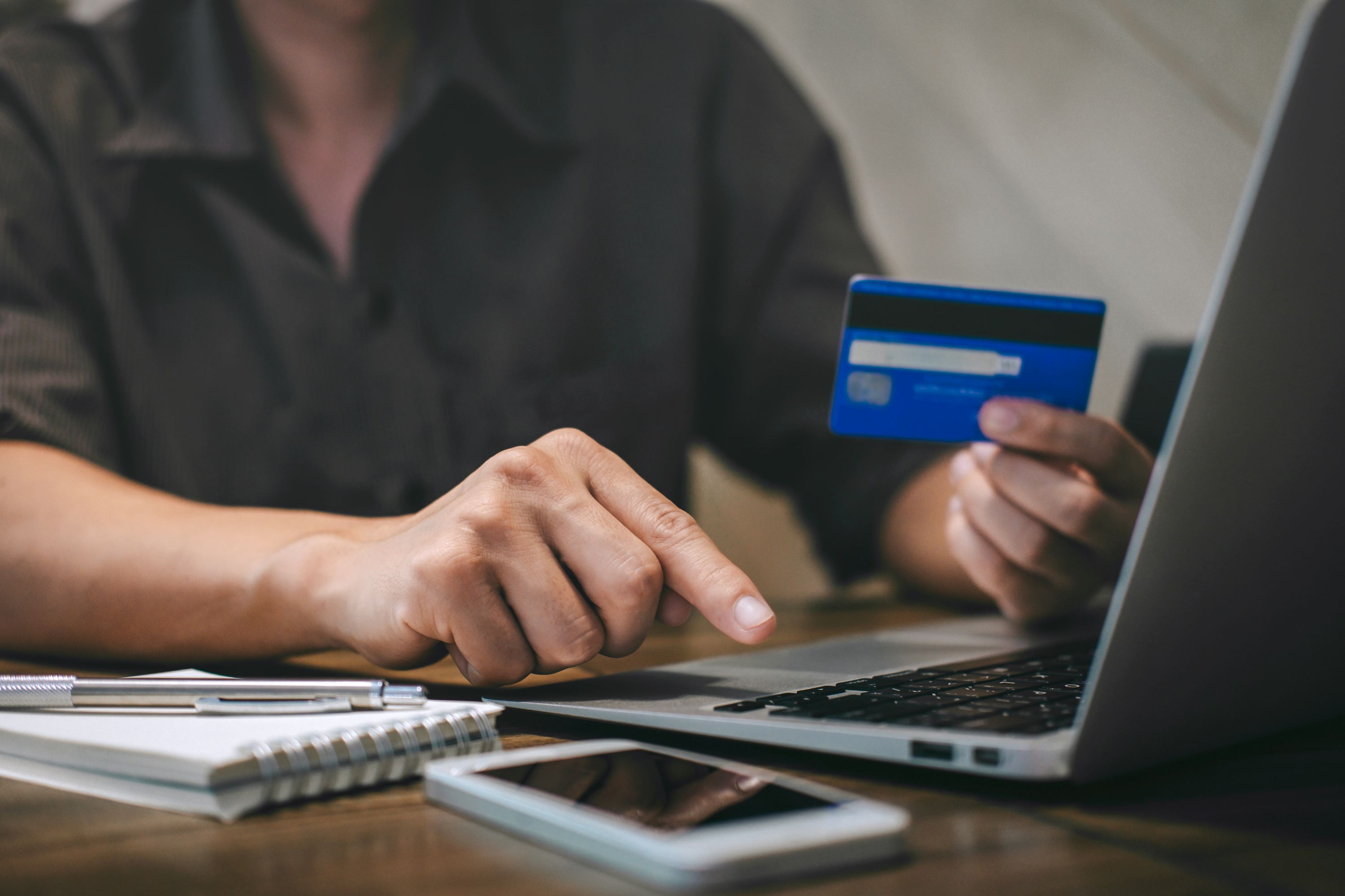 Customer using a laptop computer for online banking